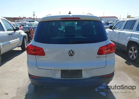 2014 Volkswagen Tiguan Sel z USA, uszkodzony, nr VIN WVGAV3AX2EW557592